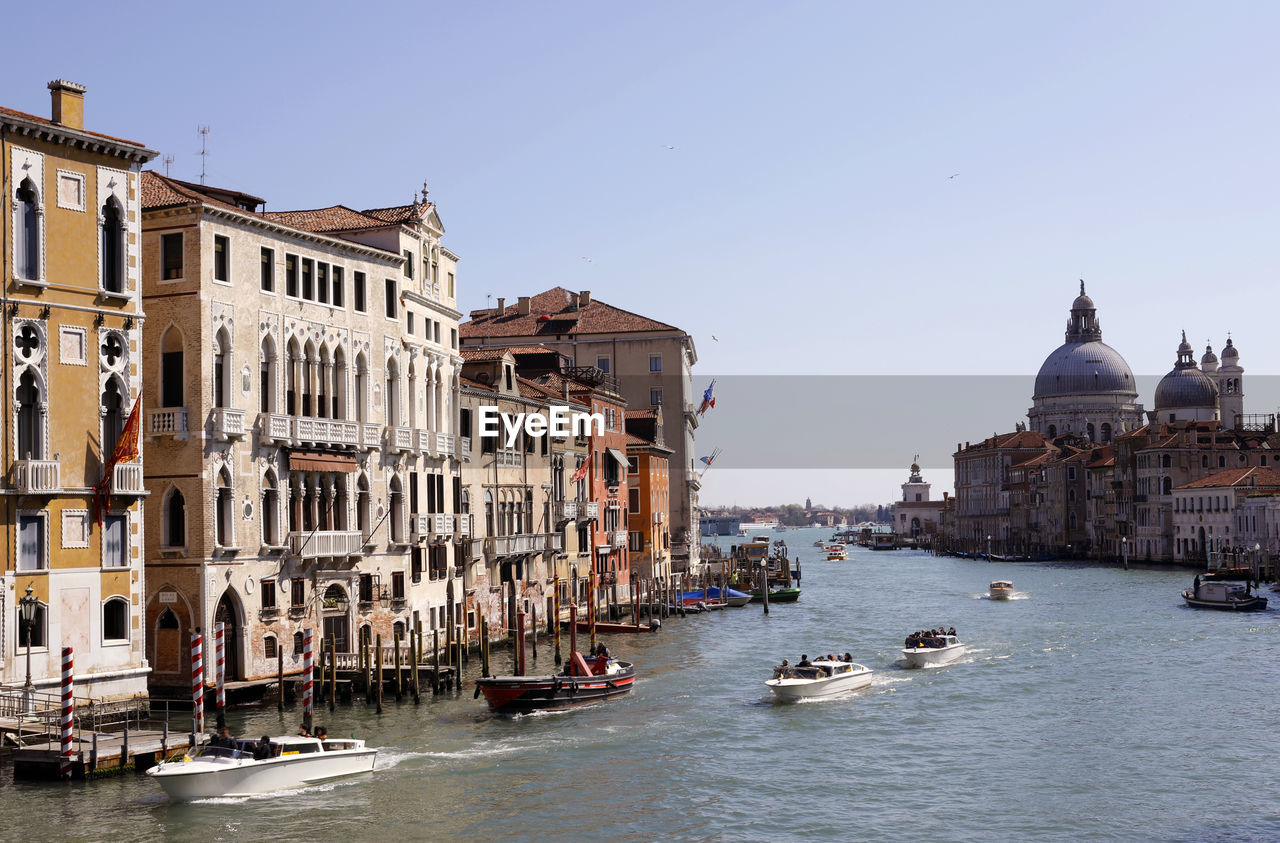 Venice, italy. grand canal, monuments, palaces, basilica della salute, perspective, soft light, boat