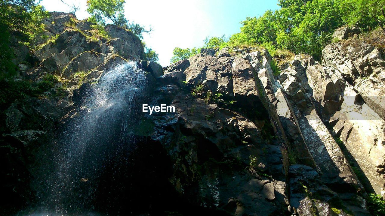 Low angle view of waterfall