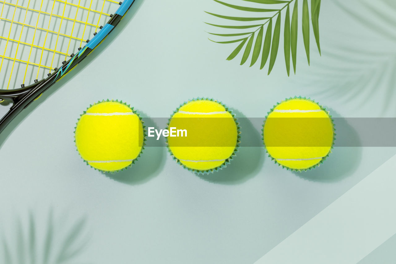 close-up of tennis balls on table