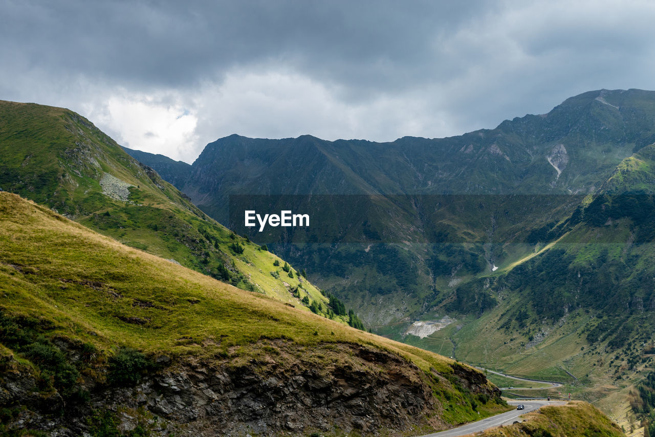 SCENIC VIEW OF MOUNTAIN AGAINST SKY