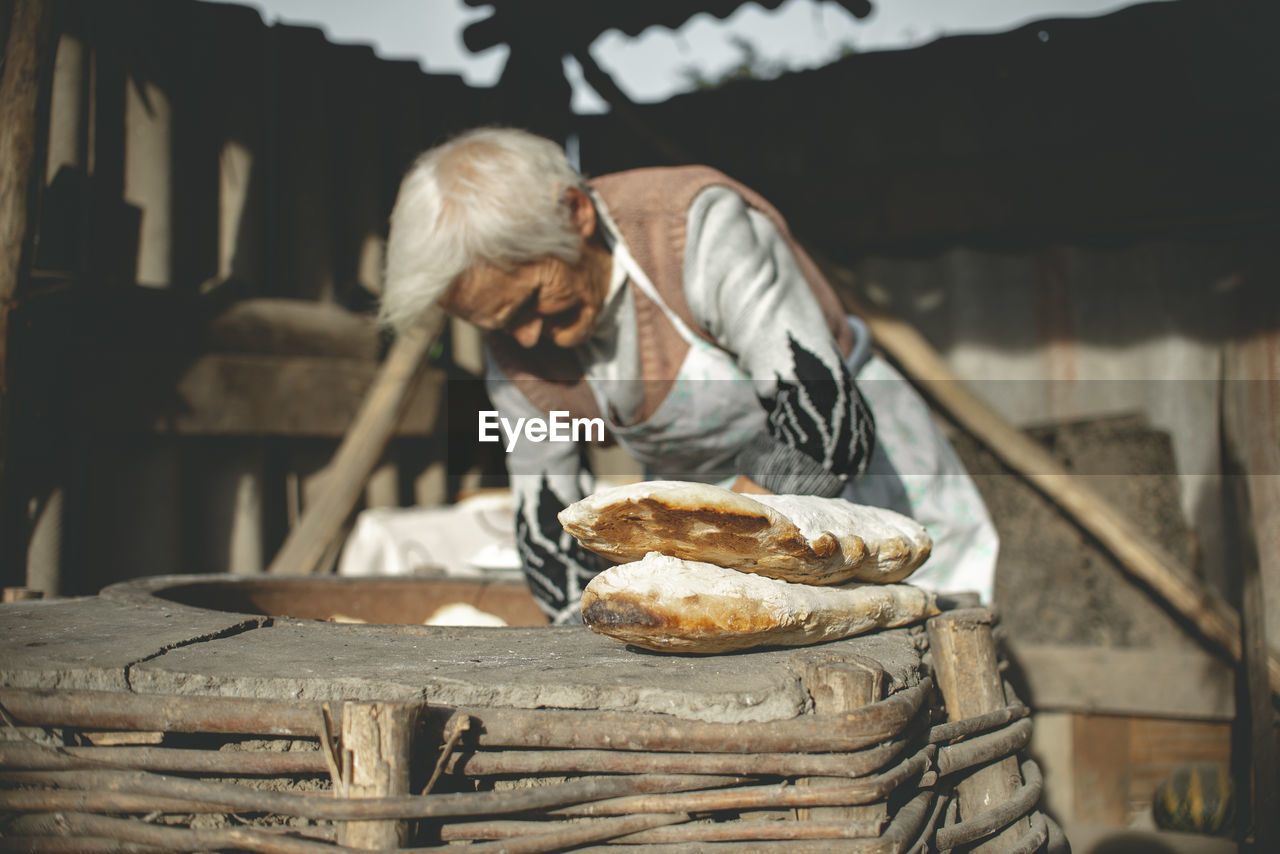 Man preparing food on table