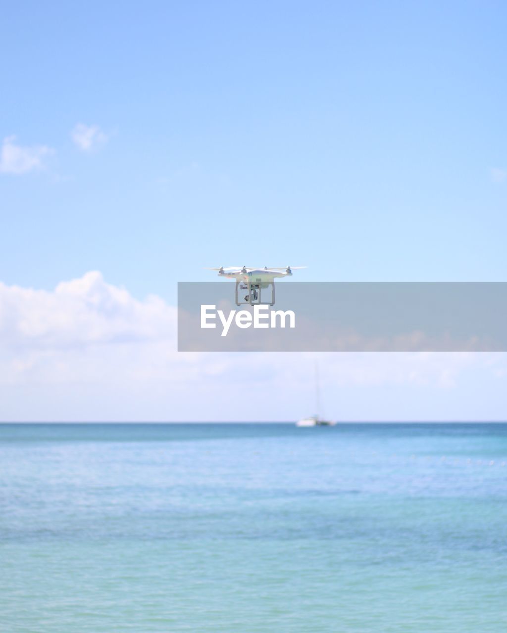 SHIP IN SEA AGAINST SKY