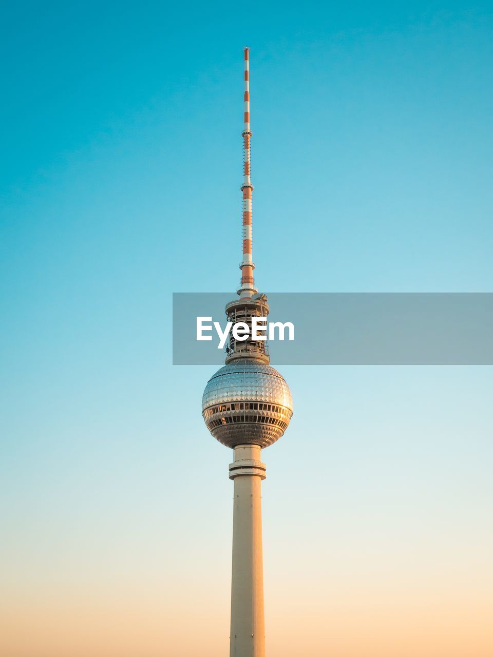 Low angle view of fernsehturm against clear sky