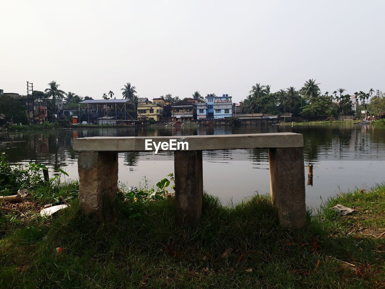 BRIDGE OVER WATER AGAINST SKY