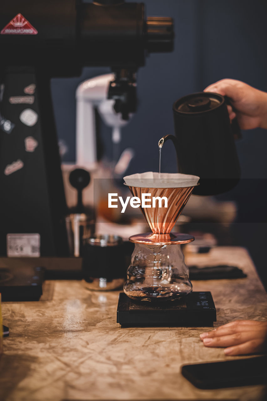 close-up of coffee in glass on table