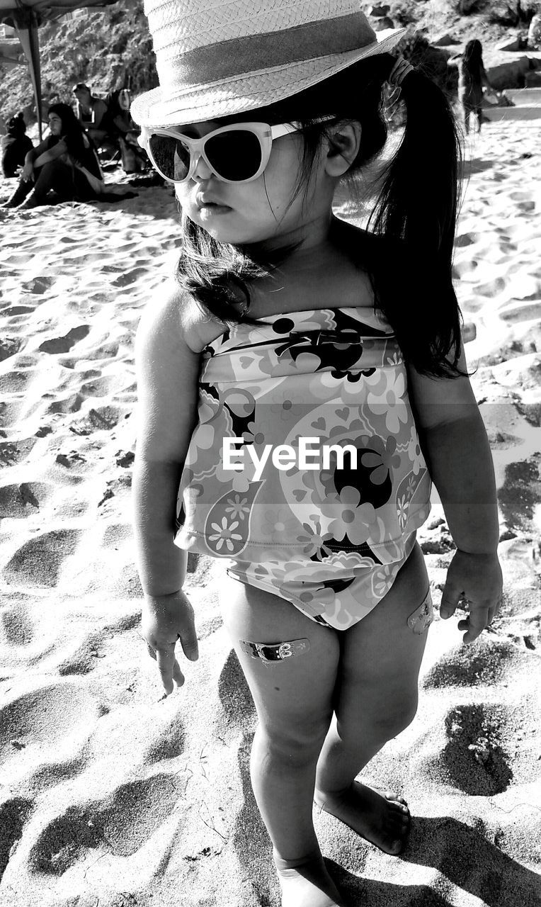 Girl standing on beach