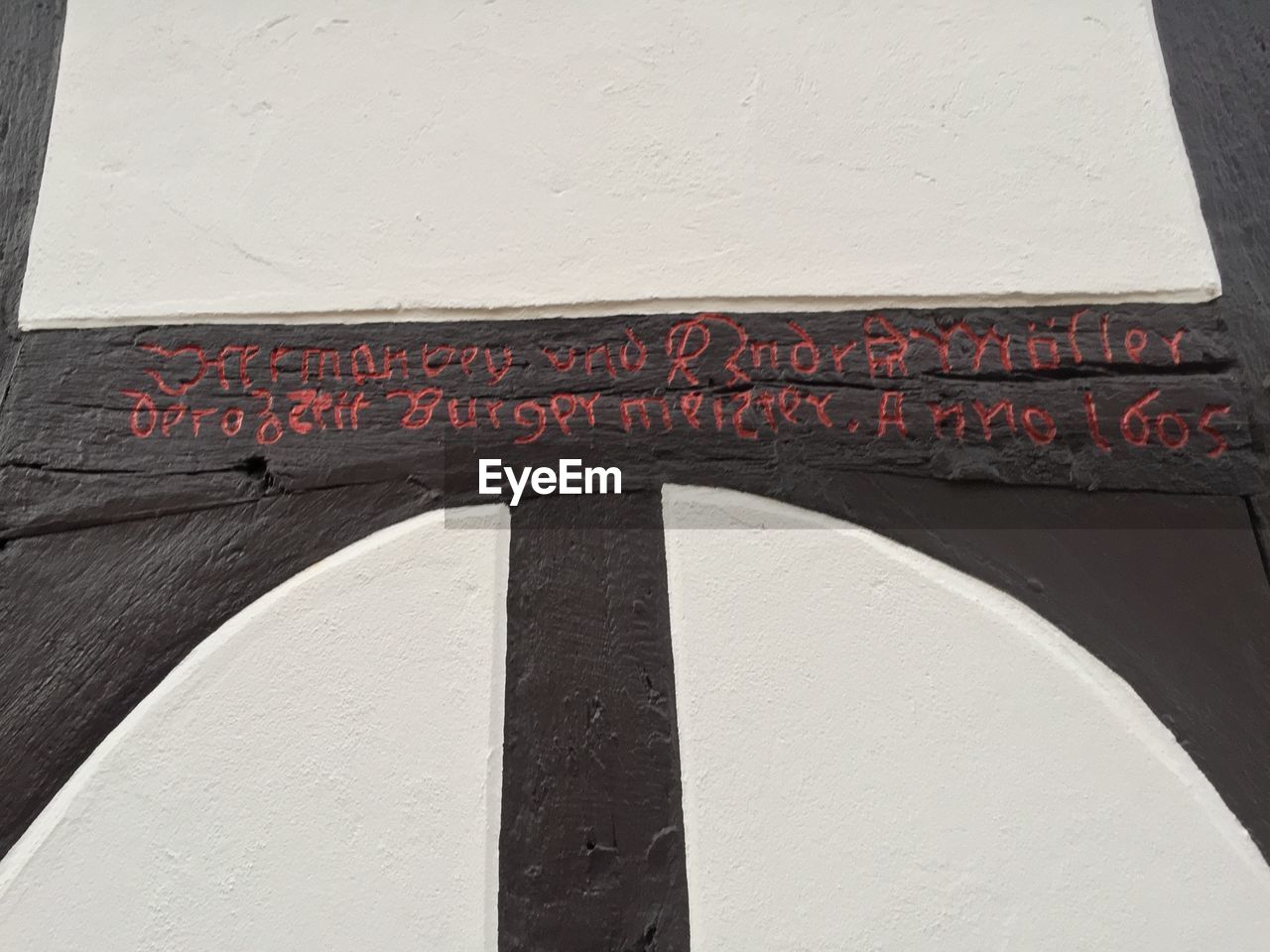 CLOSE-UP OF TEXT ON WALL