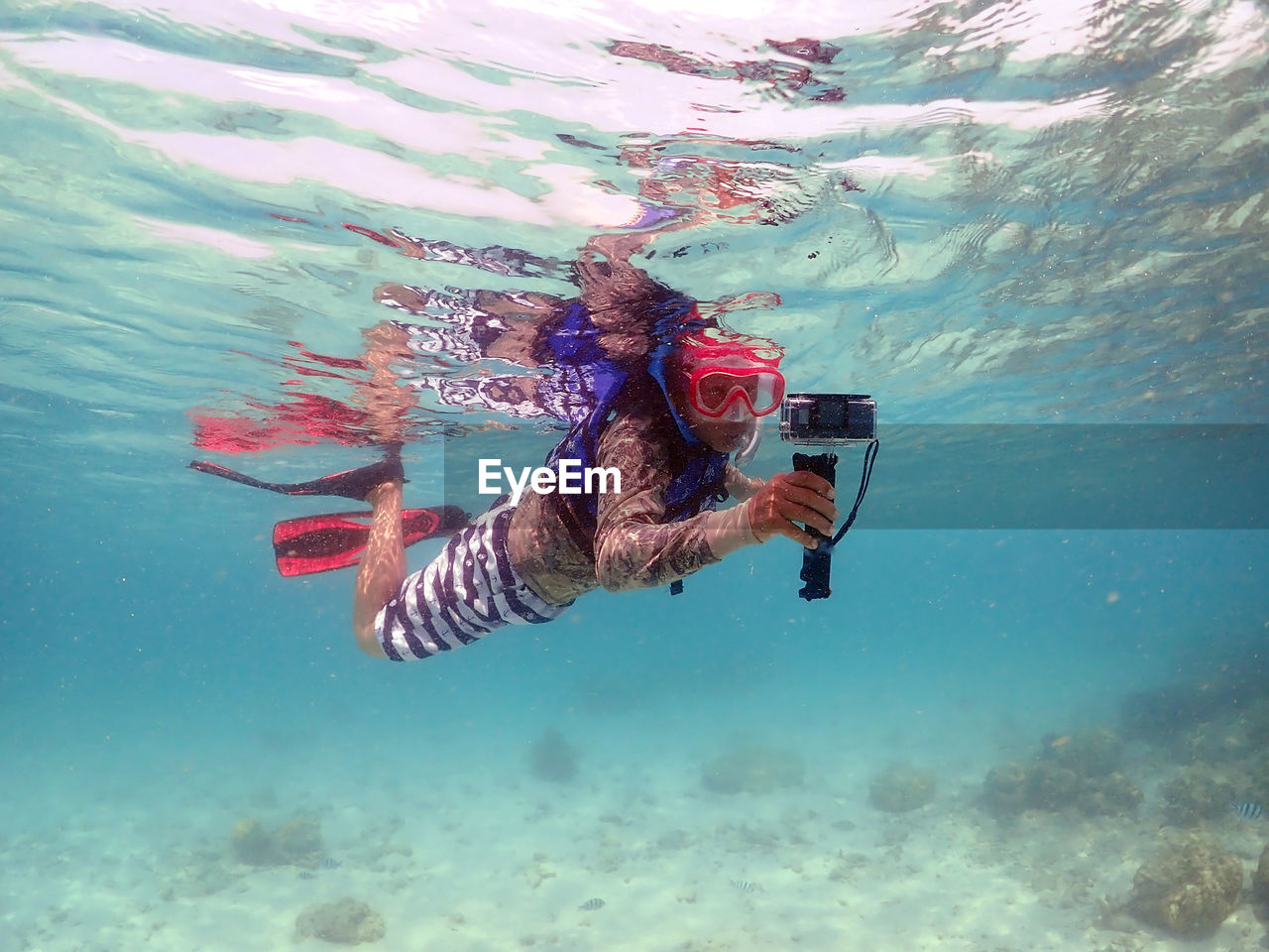 Man swimming in sea