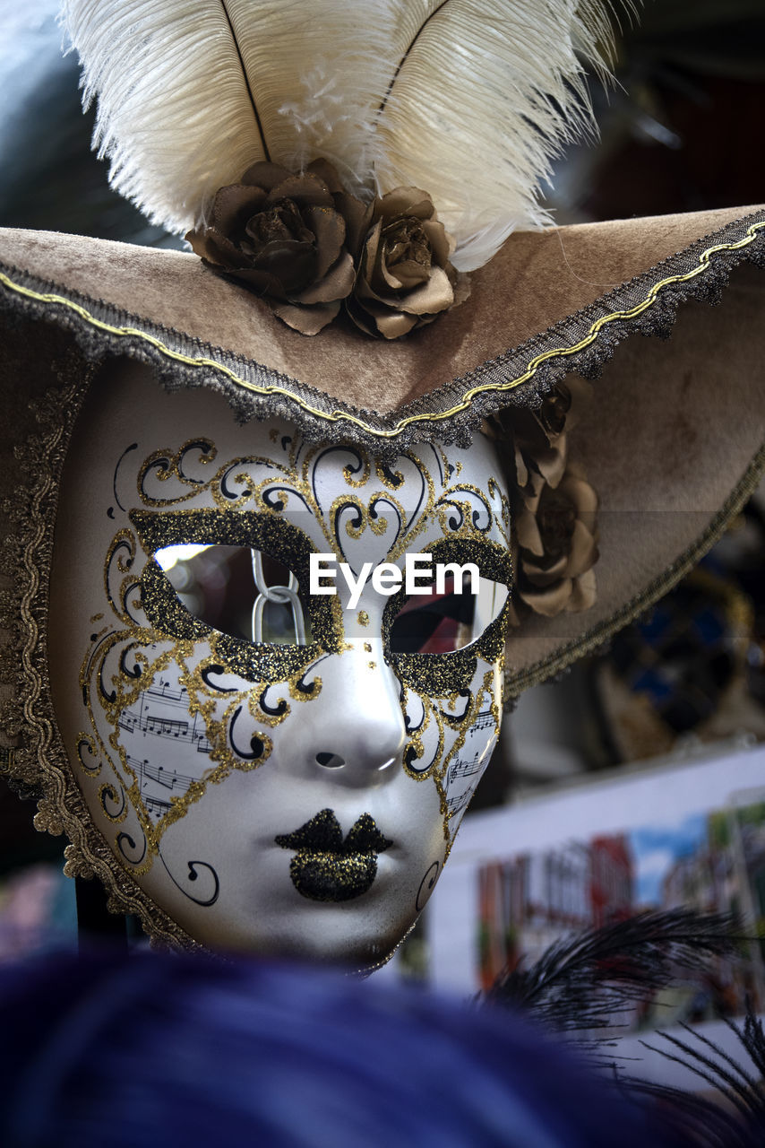 close-up portrait of woman wearing mask