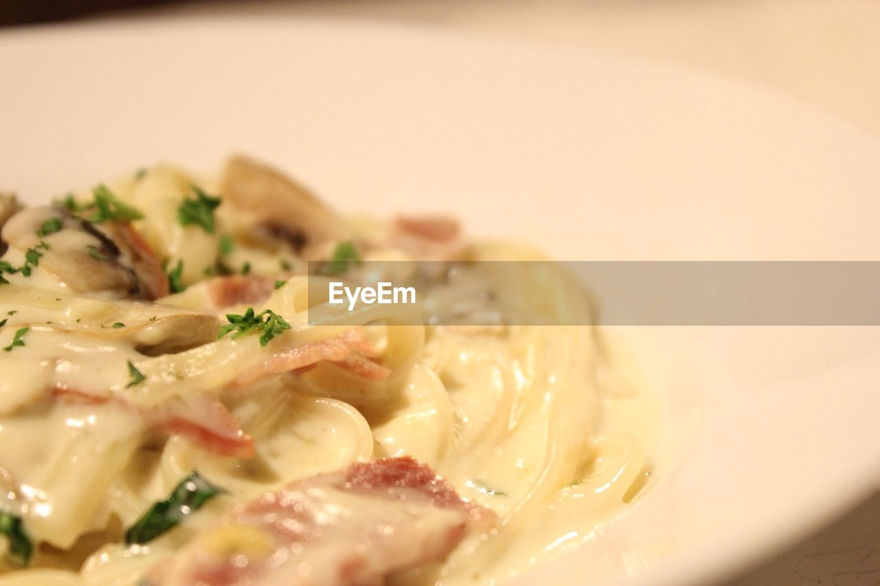 Fettucine carbonara served in plate