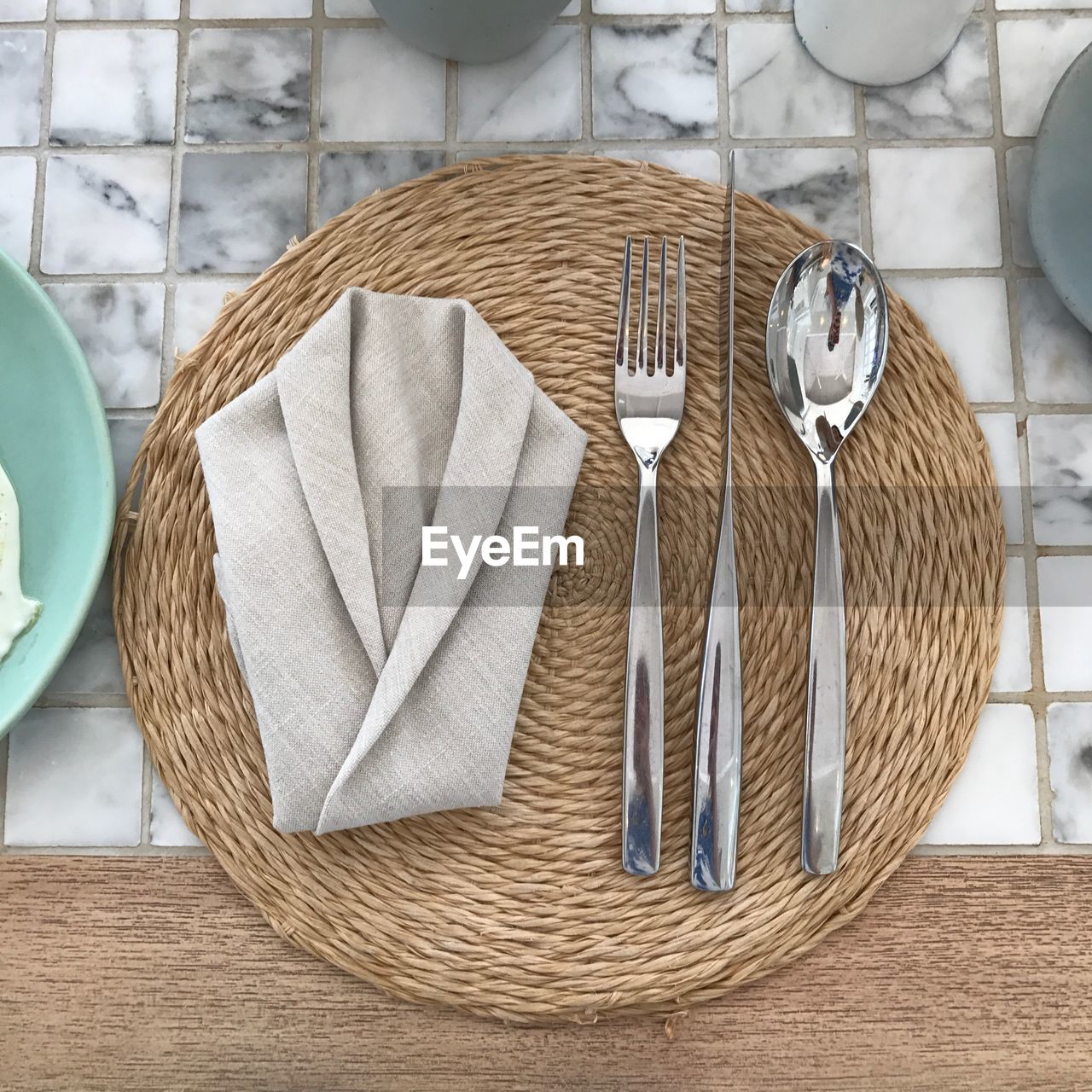 High angle view of place setting on placemat