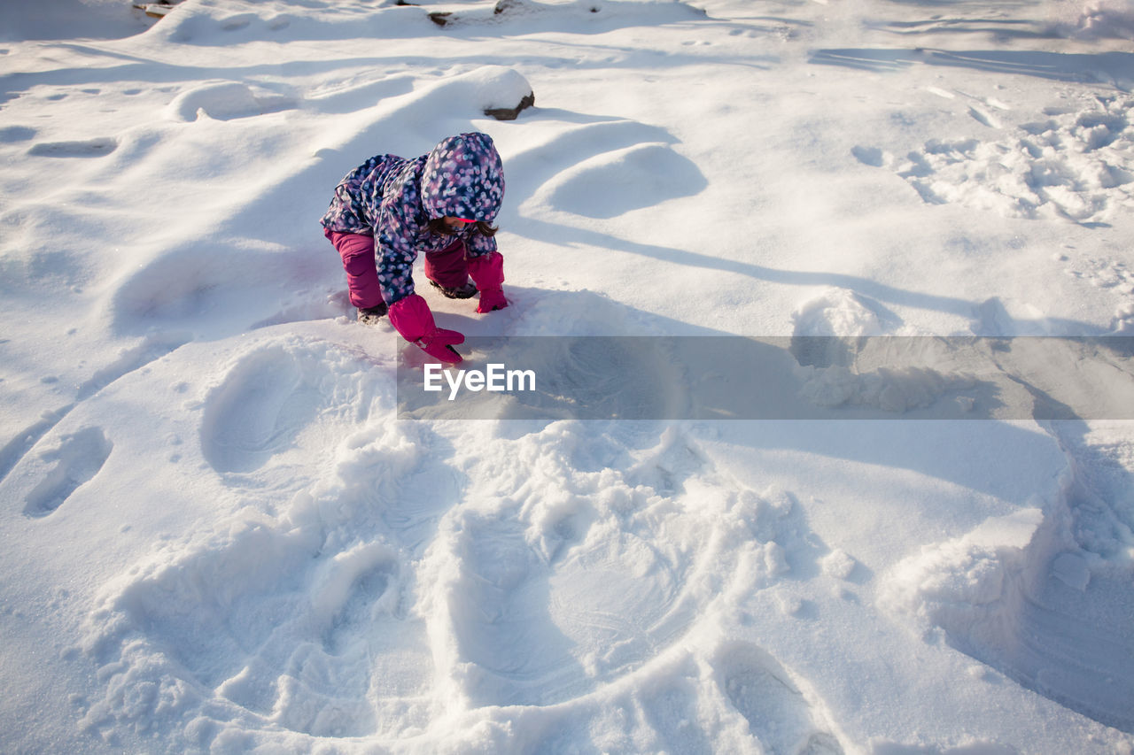 High angle view of snow covered field