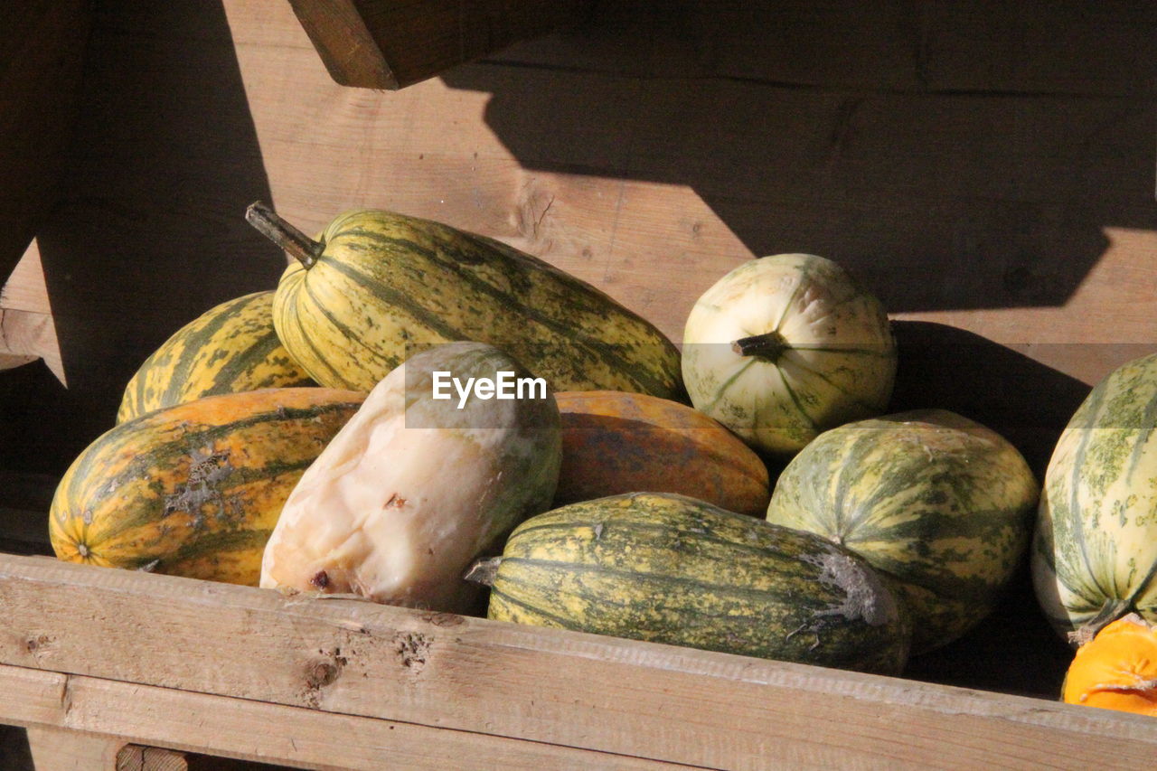 PUMPKINS IN MARKET STALL