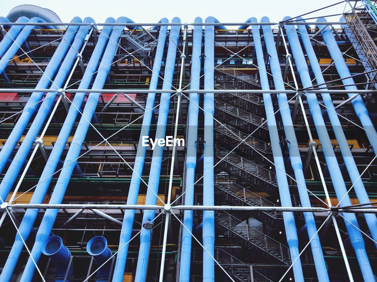 LOW ANGLE VIEW OF CONSTRUCTION SITE AGAINST BUILDINGS