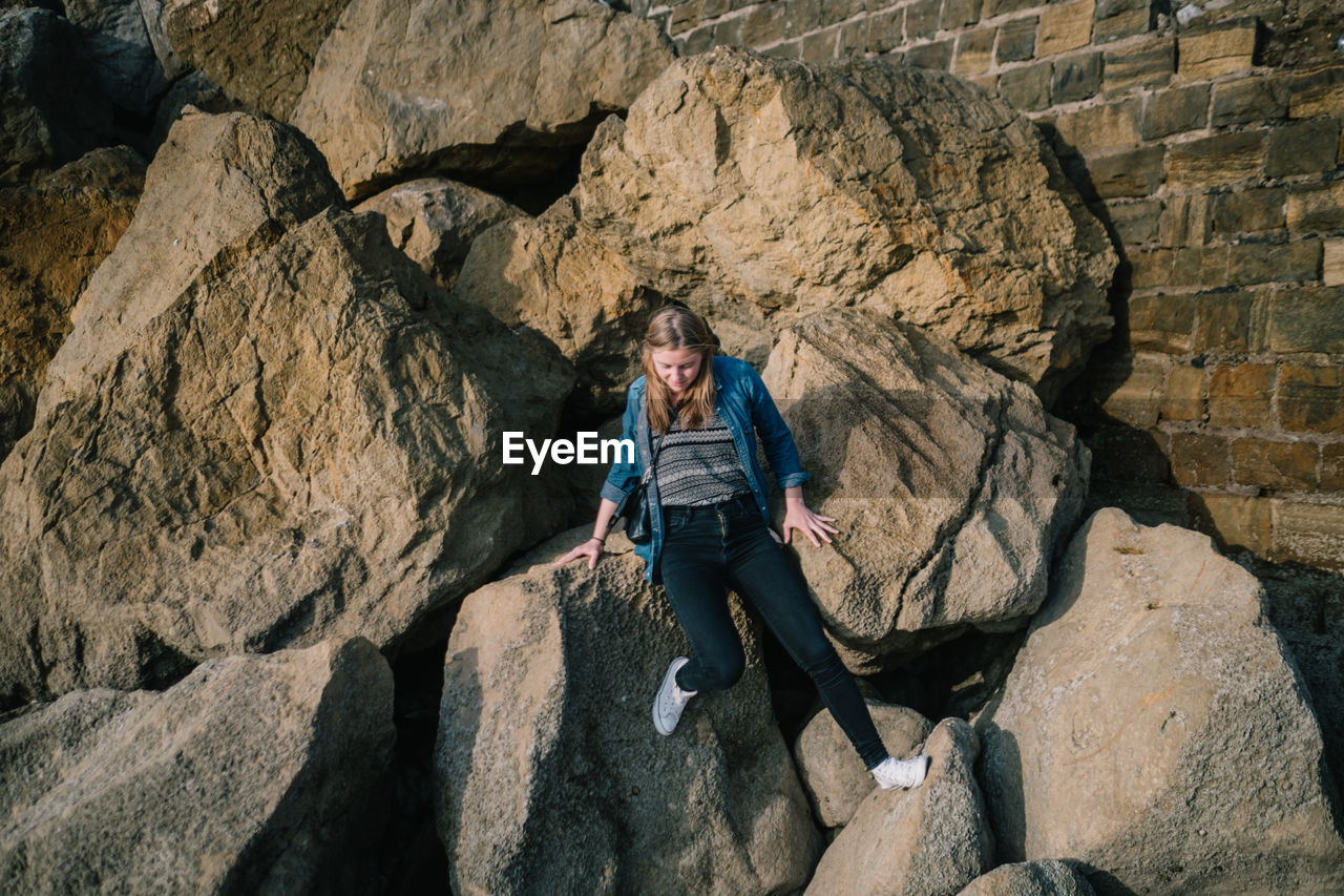 High angle view of woman on rock