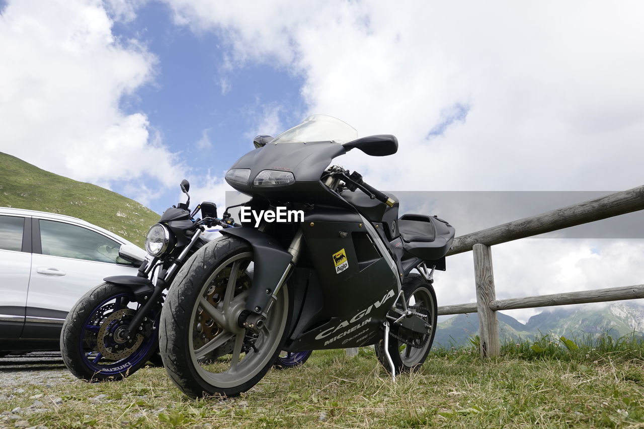 MOTORCYCLE PARKED ON LAND