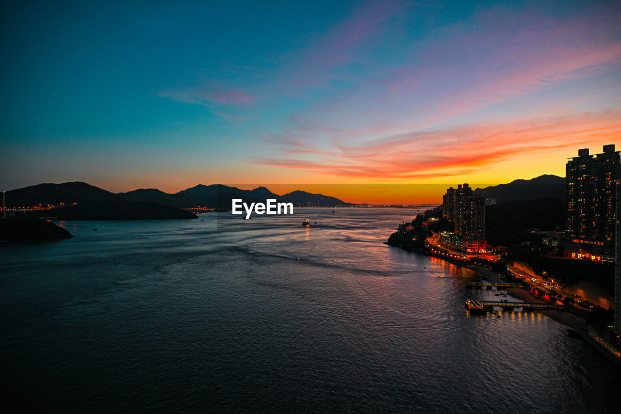 Scenic view of sea against sky at sunset