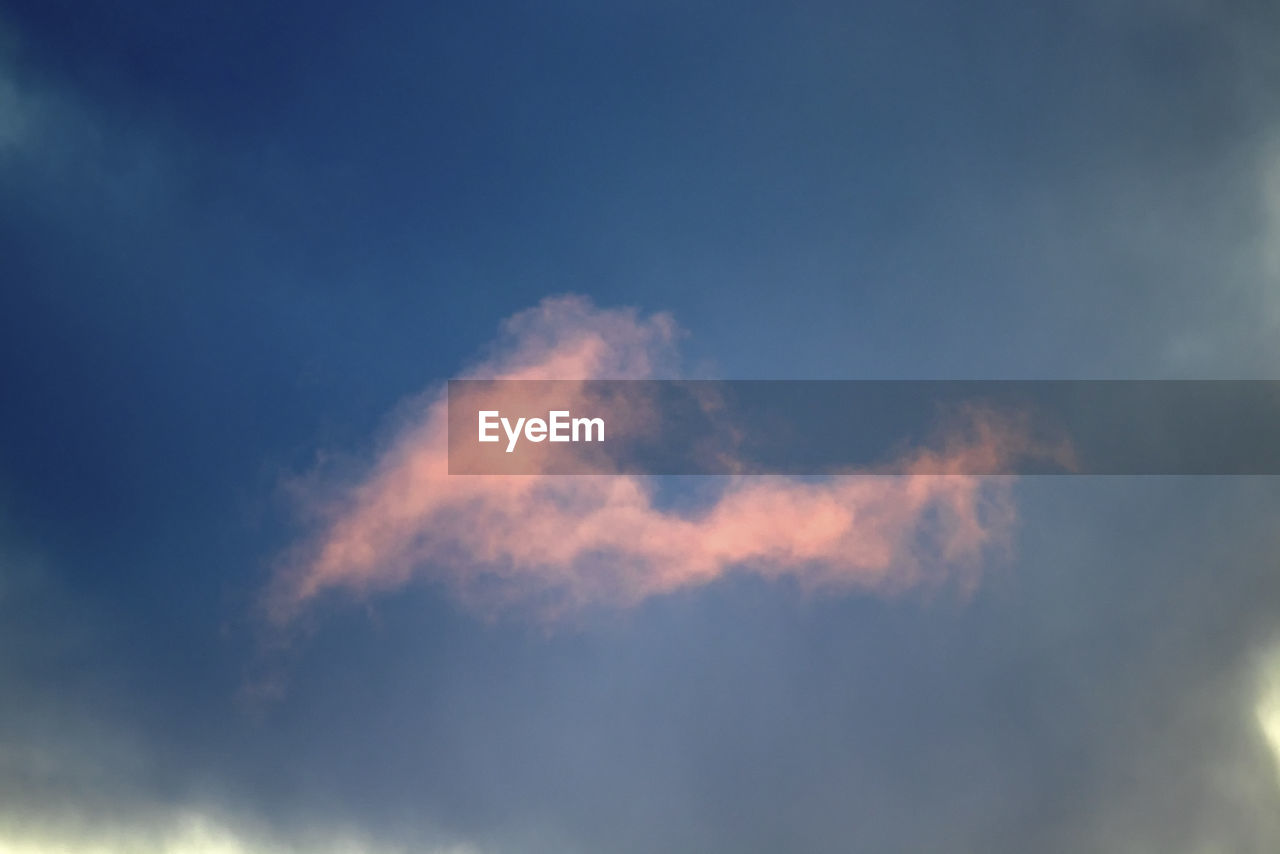 LOW ANGLE VIEW OF CLOUDS IN BLUE SKY