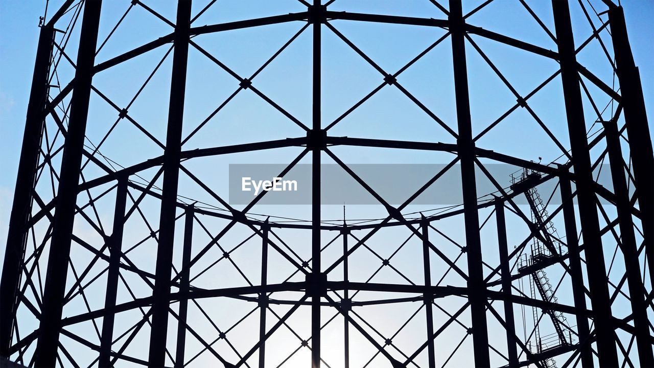 Low angle view of metallic structure against sky