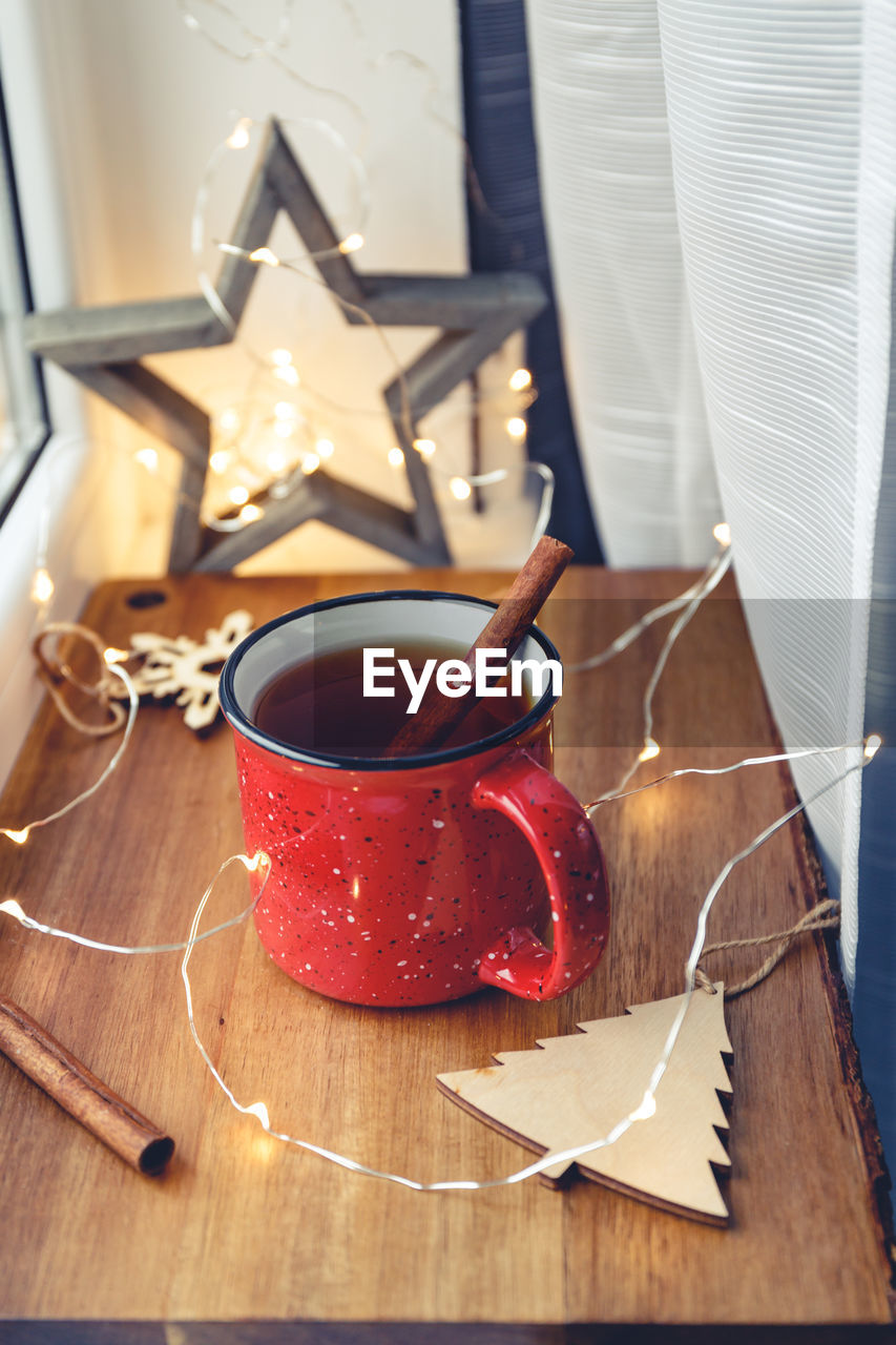 High angle view of tea with christmas decorations on table