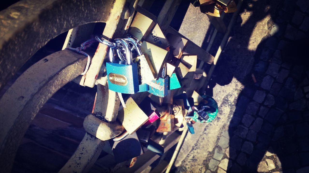 Close-up of padlocks in railing