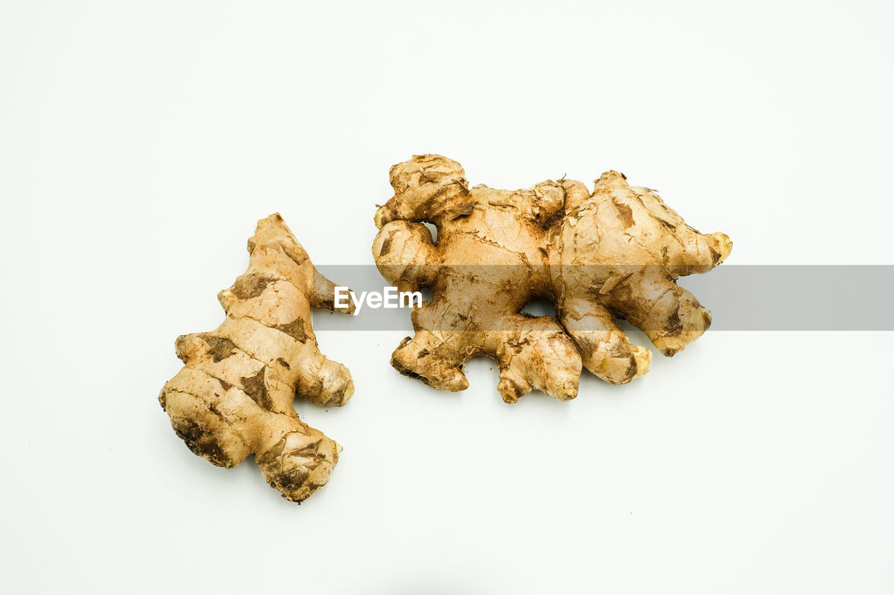 HIGH ANGLE VIEW OF COOKIES ON WHITE BACKGROUND