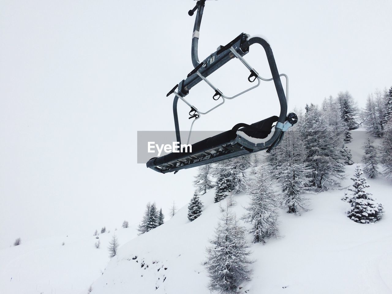 Low angle view of ski lift during winter