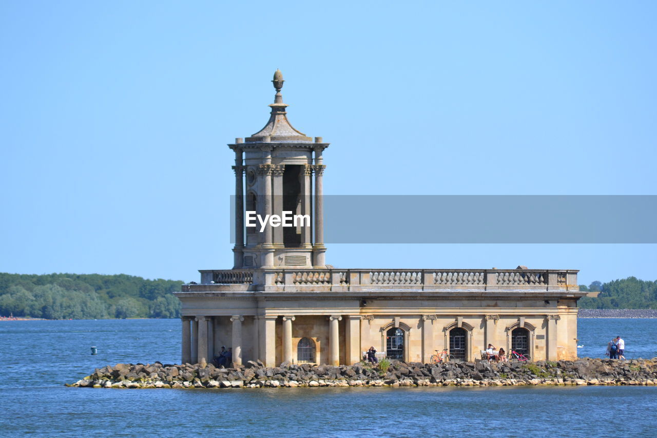 View of historical building against clear blue sky