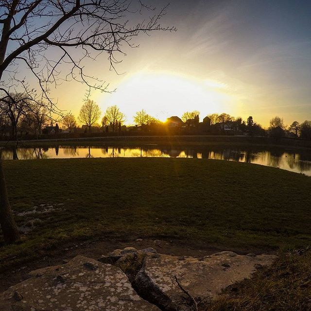 SUN SHINING OVER RIVER