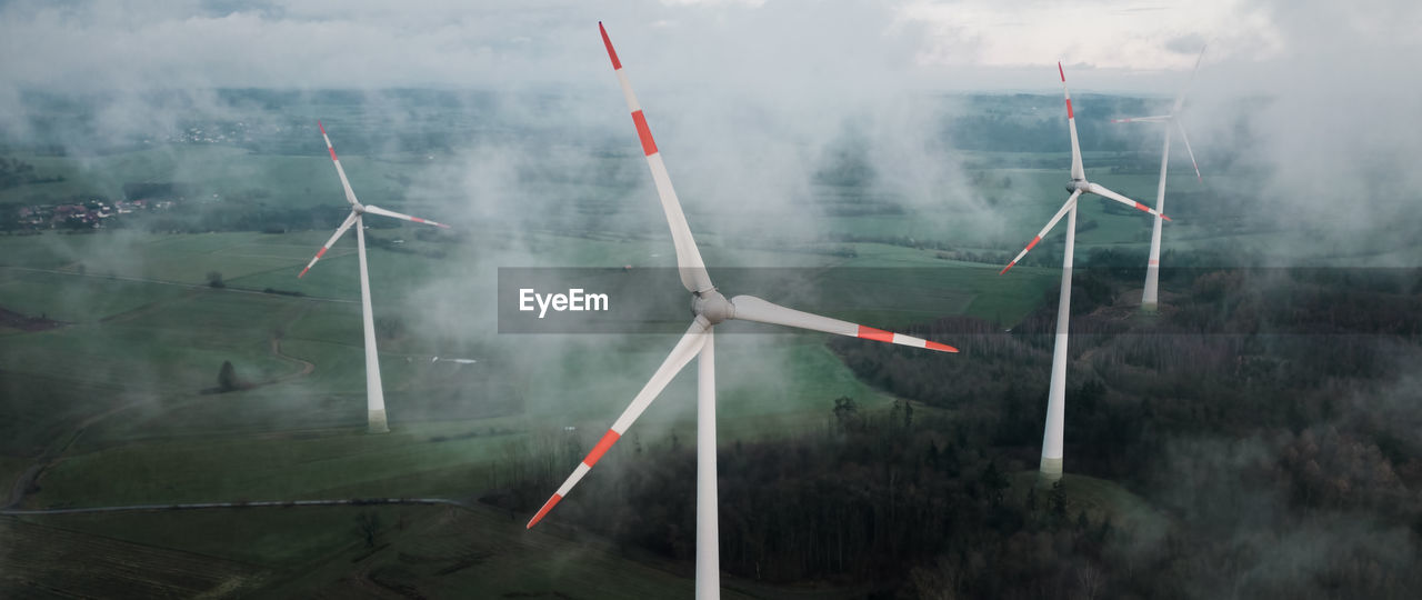 wind, environment, nature, no people, fog, smoke, turbine, environmental conservation, wind turbine, wind farm, wind power, sky, cloud, power generation, transportation, renewable energy, day, outdoors, air vehicle, alternative energy, airplane, landscape, environmental issues, land