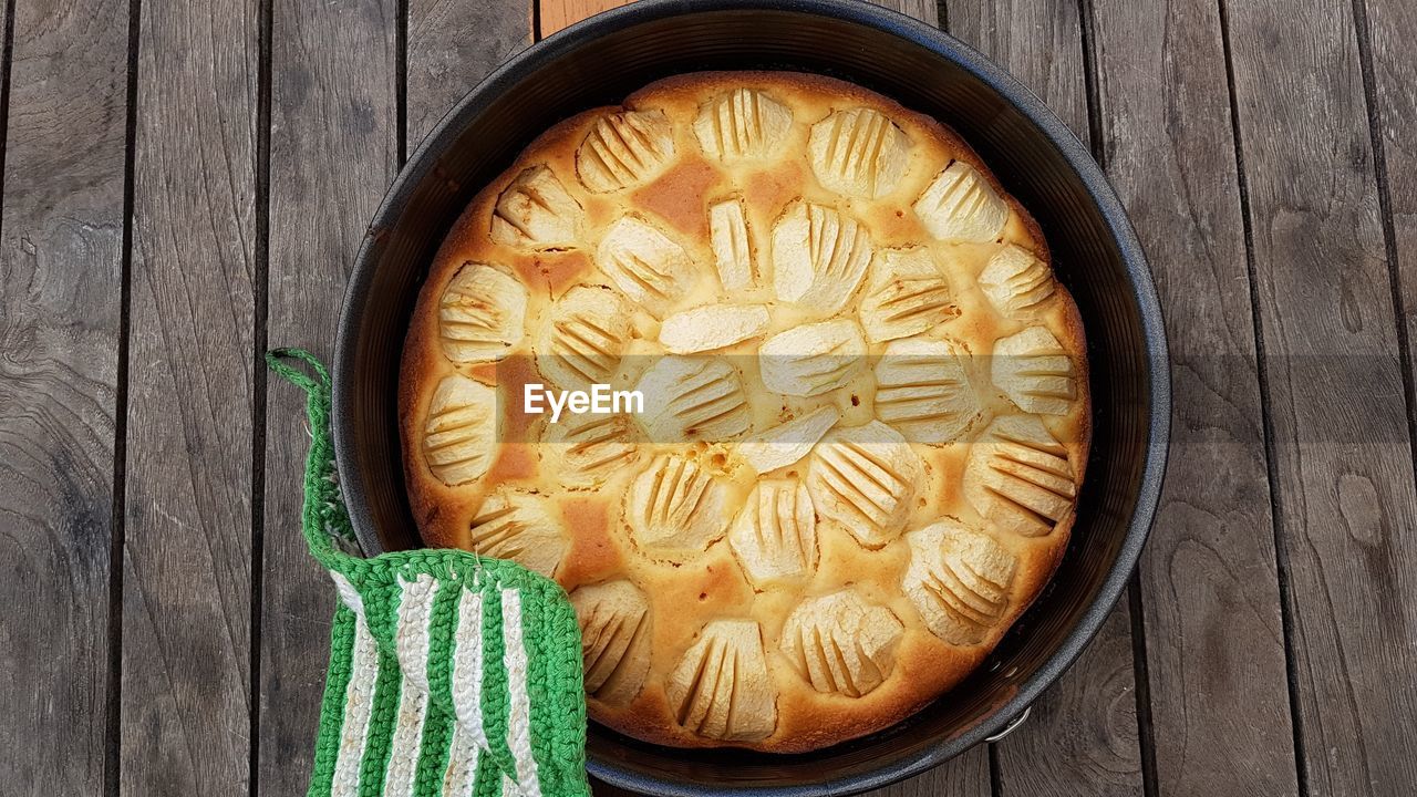 High angle view of apple cake on table