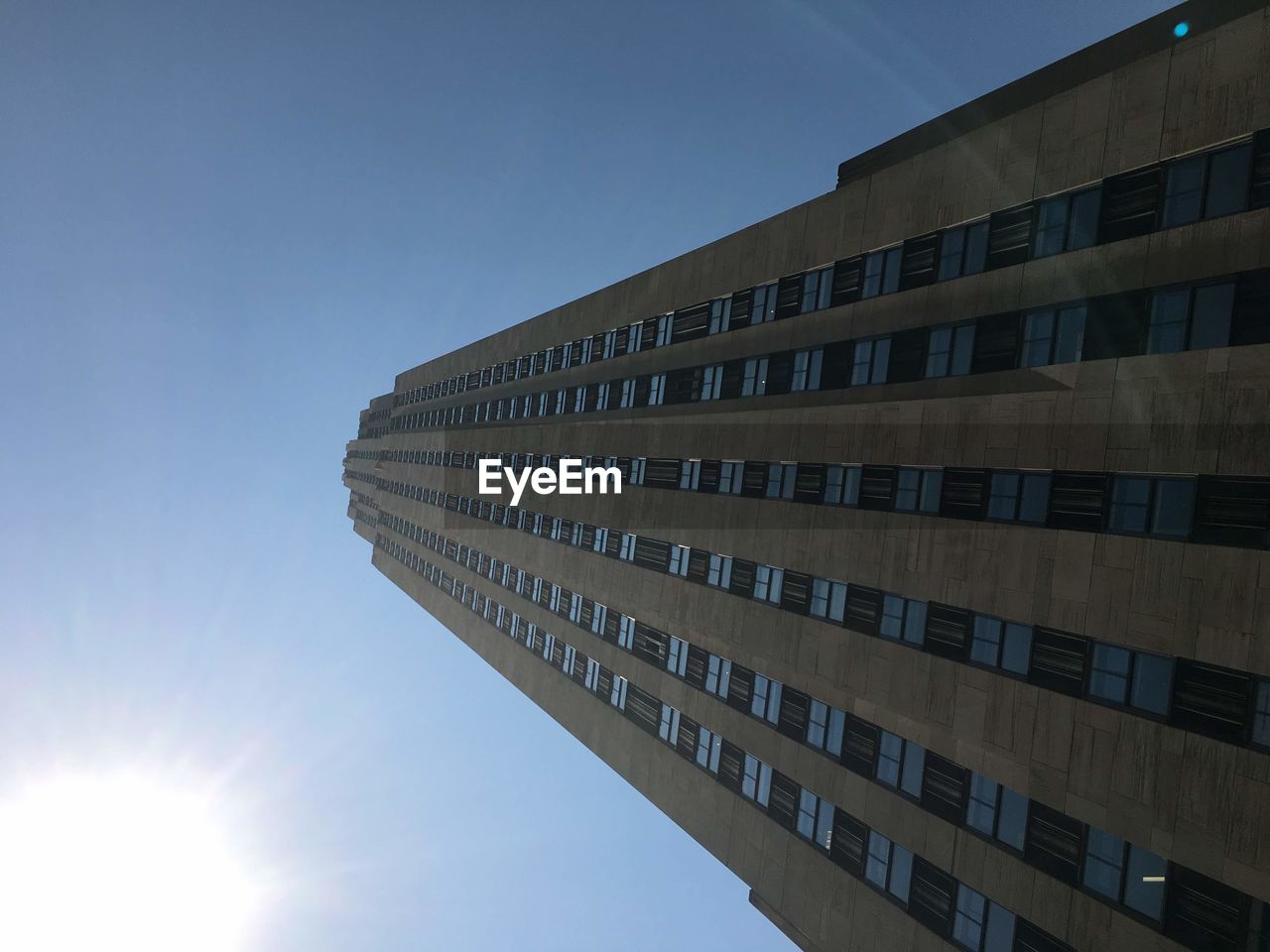 Low angle view of modern building against clear sky