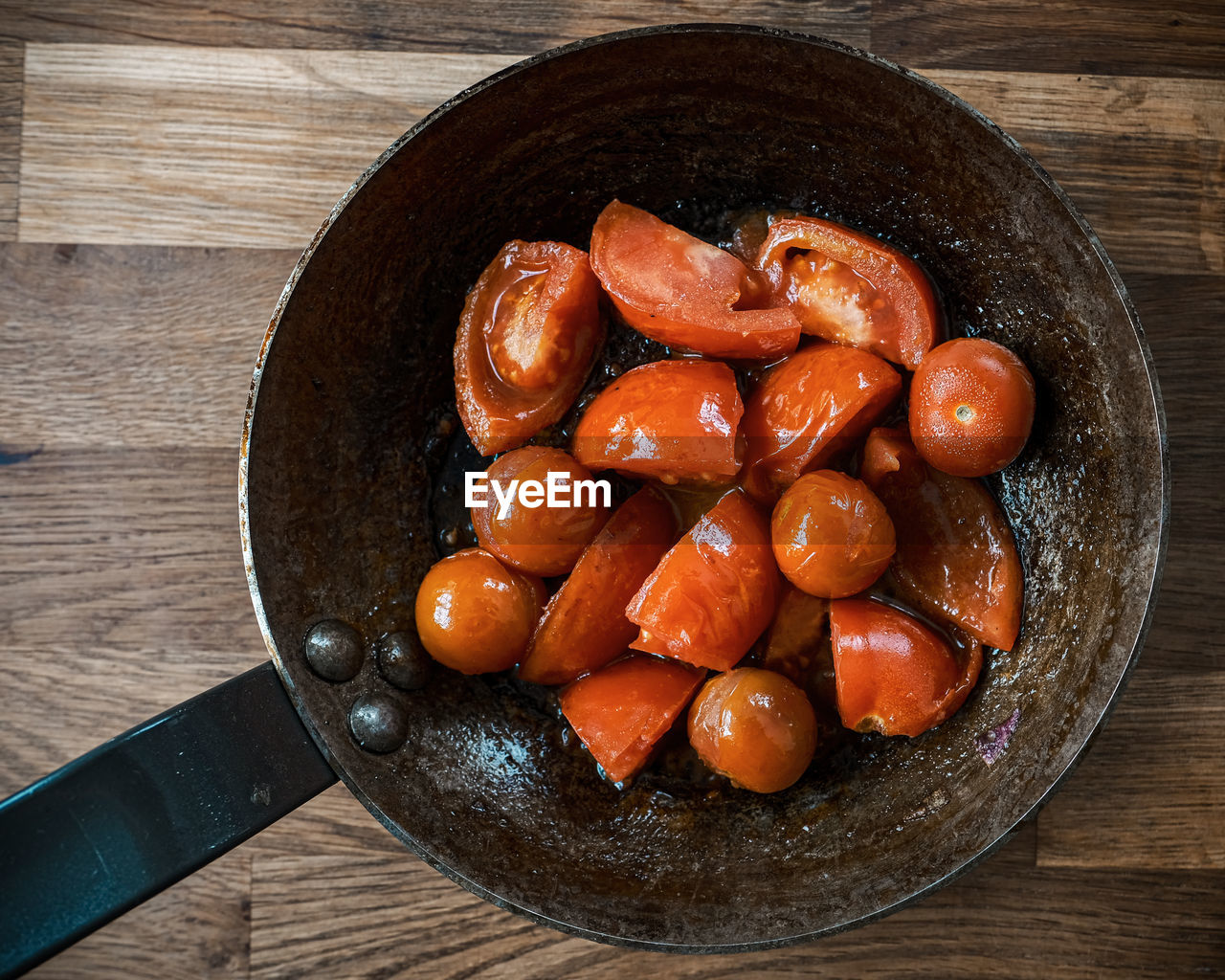 High angle view of tomatoes  in pan on table
