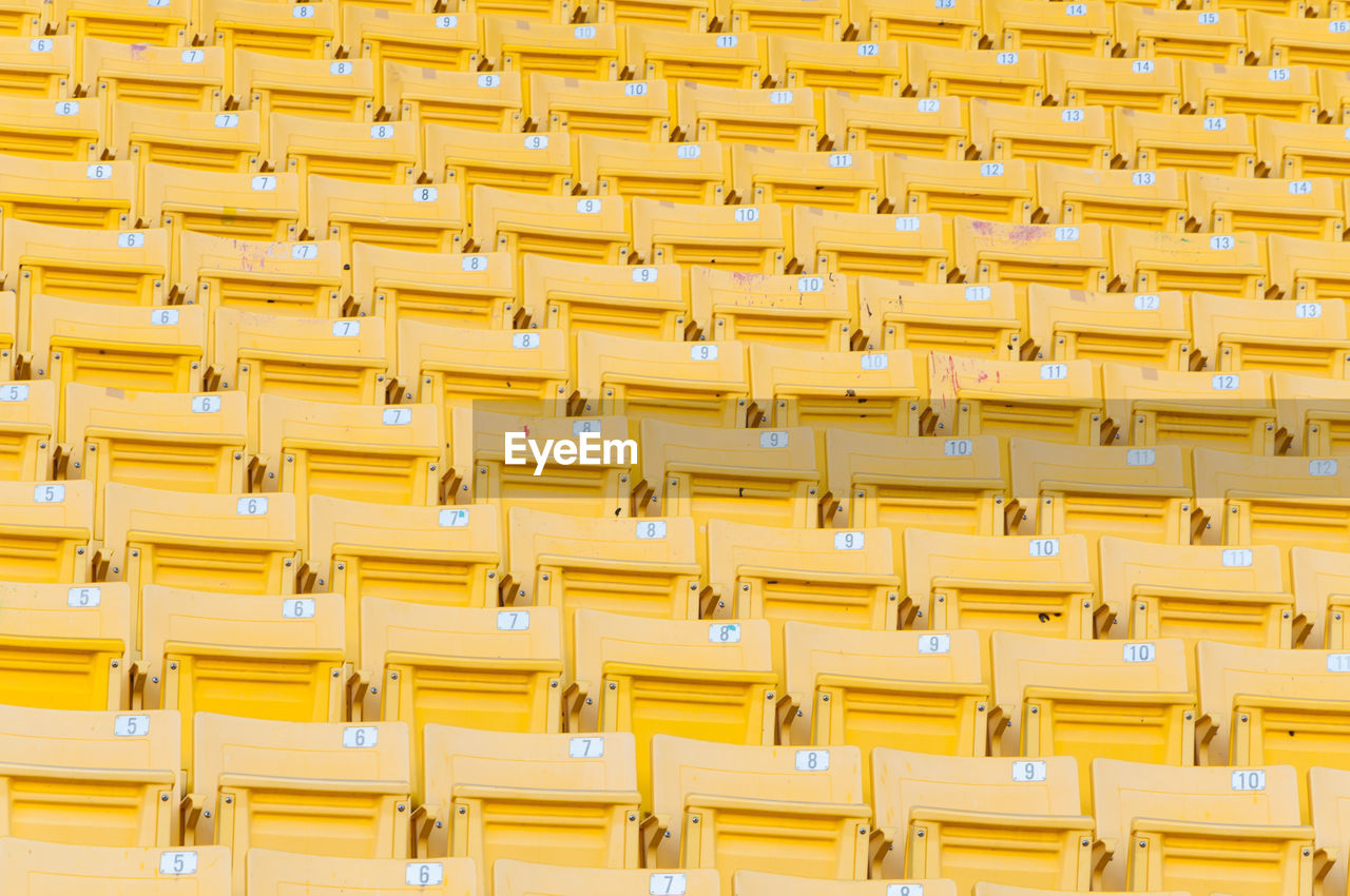 Full frame shot of yellow seats