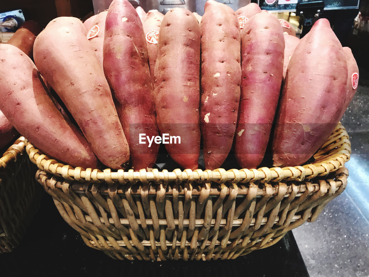 CLOSE-UP OF CARROTS IN BASKET