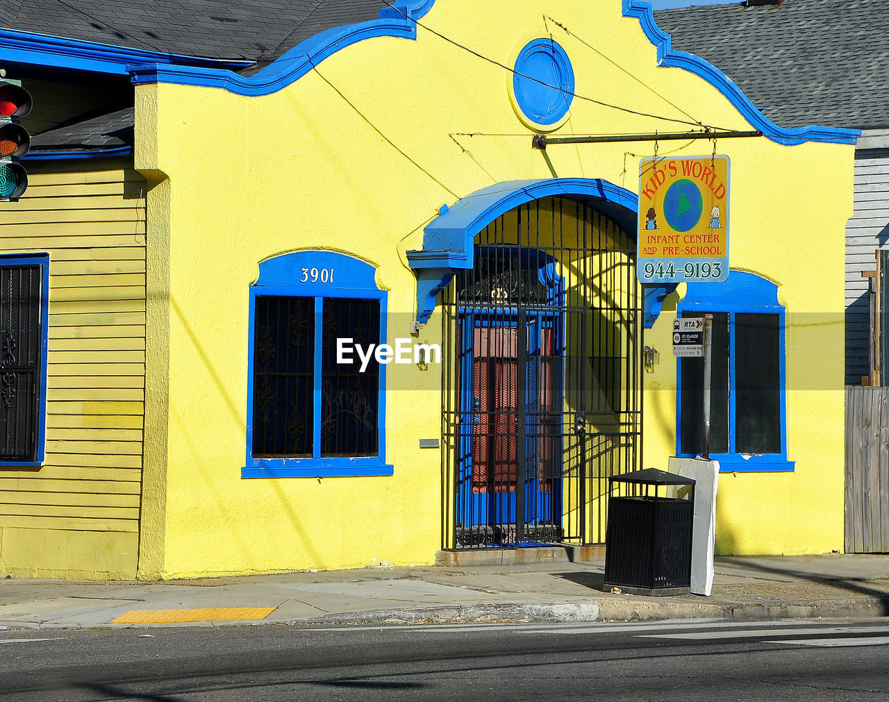 YELLOW OPEN DOOR OF BUILDING