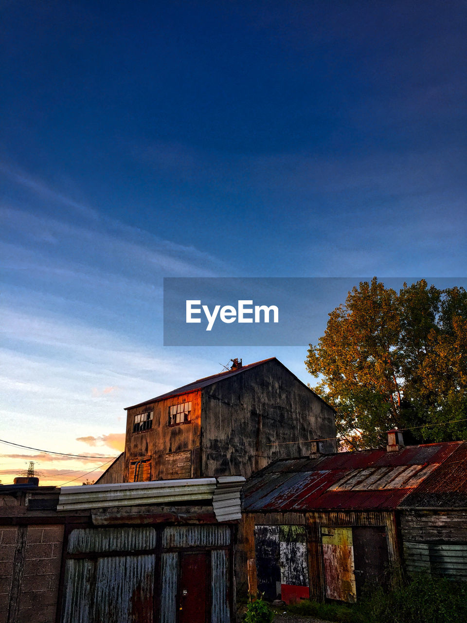 BUILT STRUCTURES AGAINST BLUE SKY