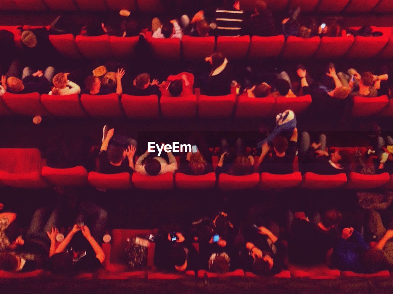 High angle view of people sitting in cinema hall