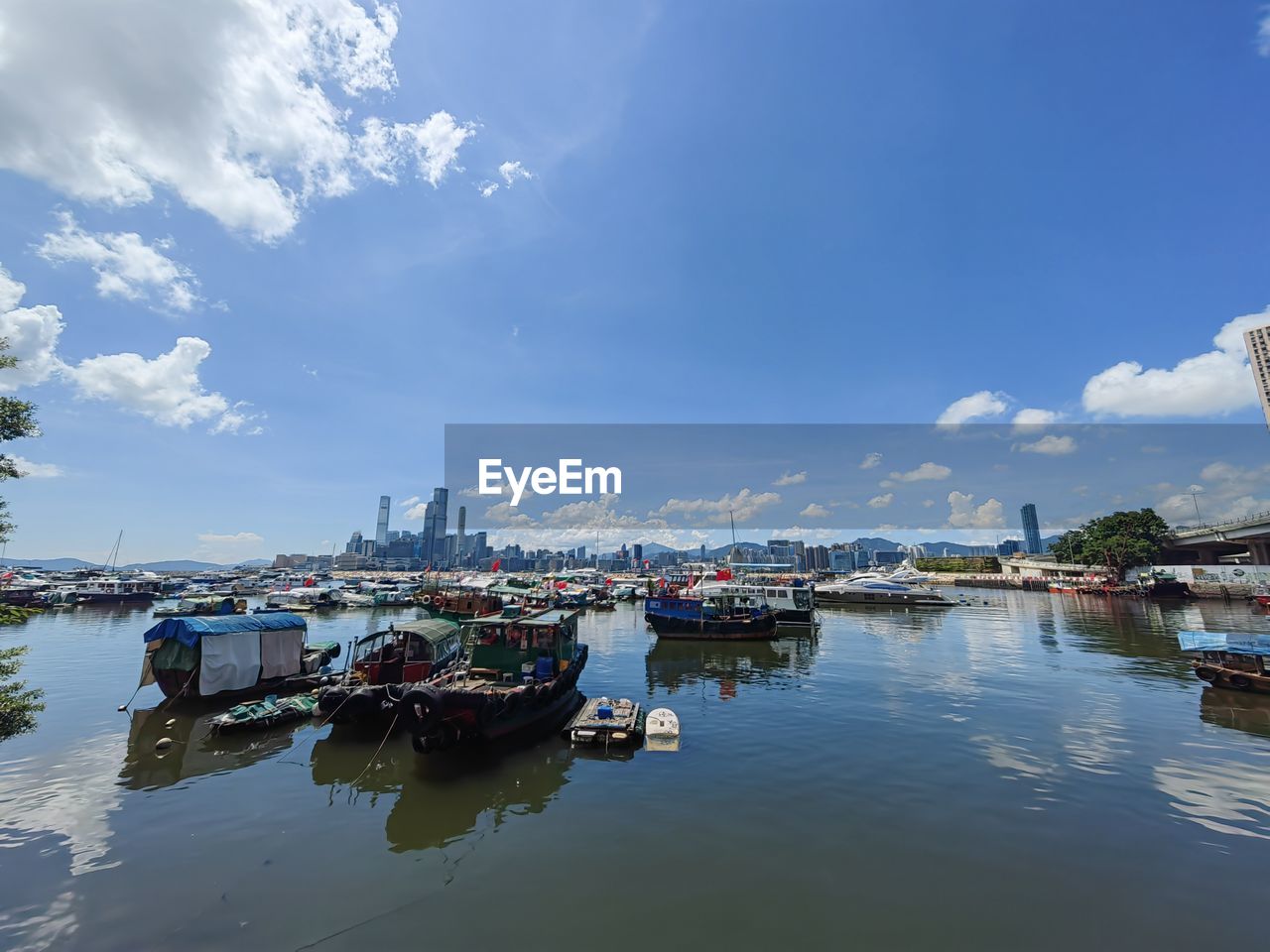 Boats moored at harbor