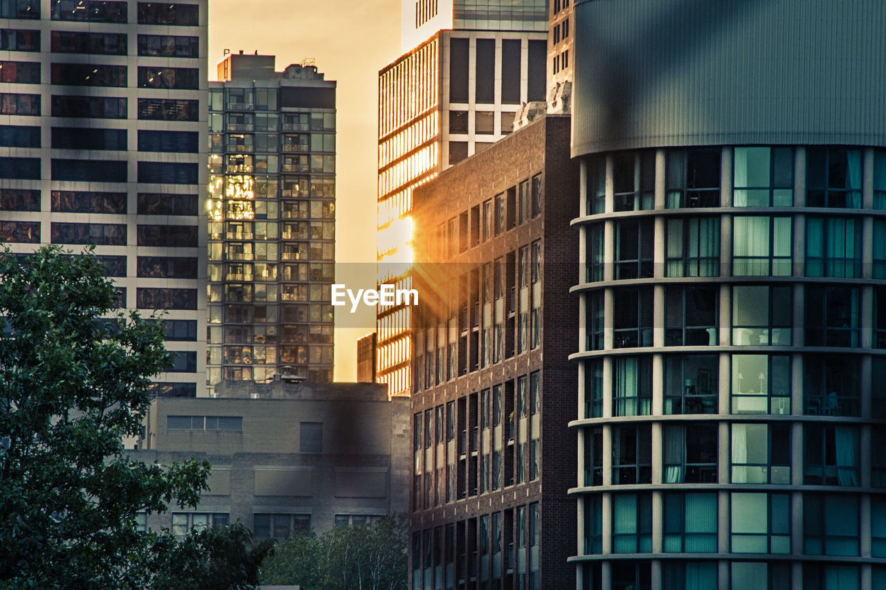LOW ANGLE VIEW OF MODERN BUILDINGS IN CITY