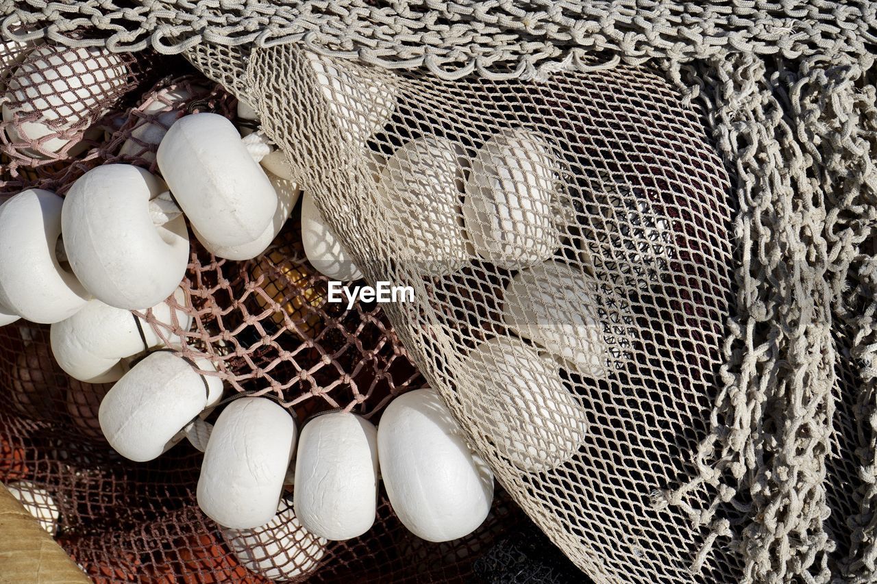 Close-up of fishing net in basket