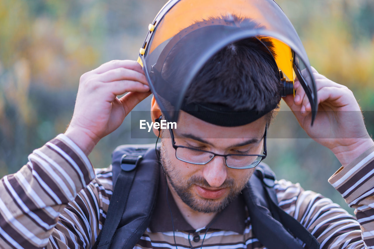 Young man wearing safety equipment
