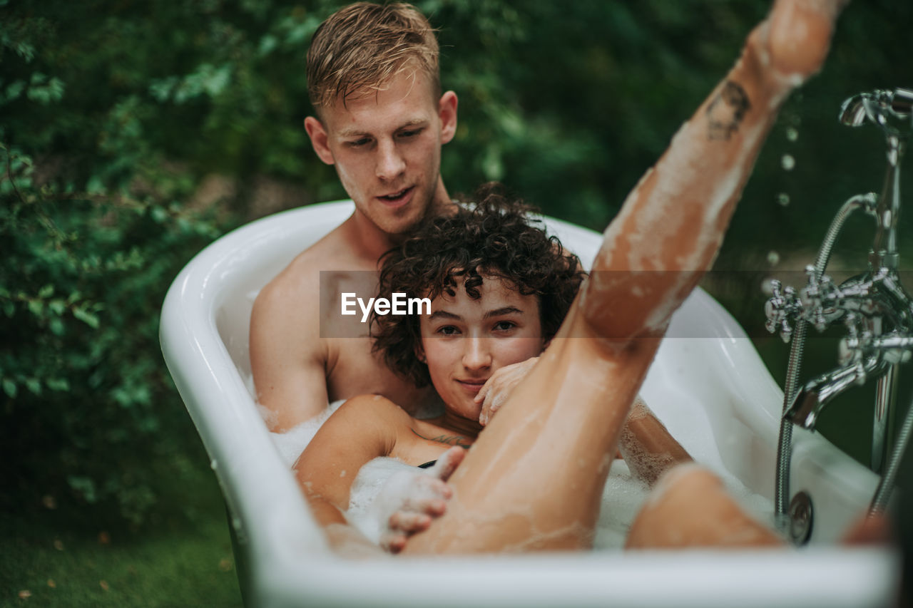 Portrait of young man in bathroom