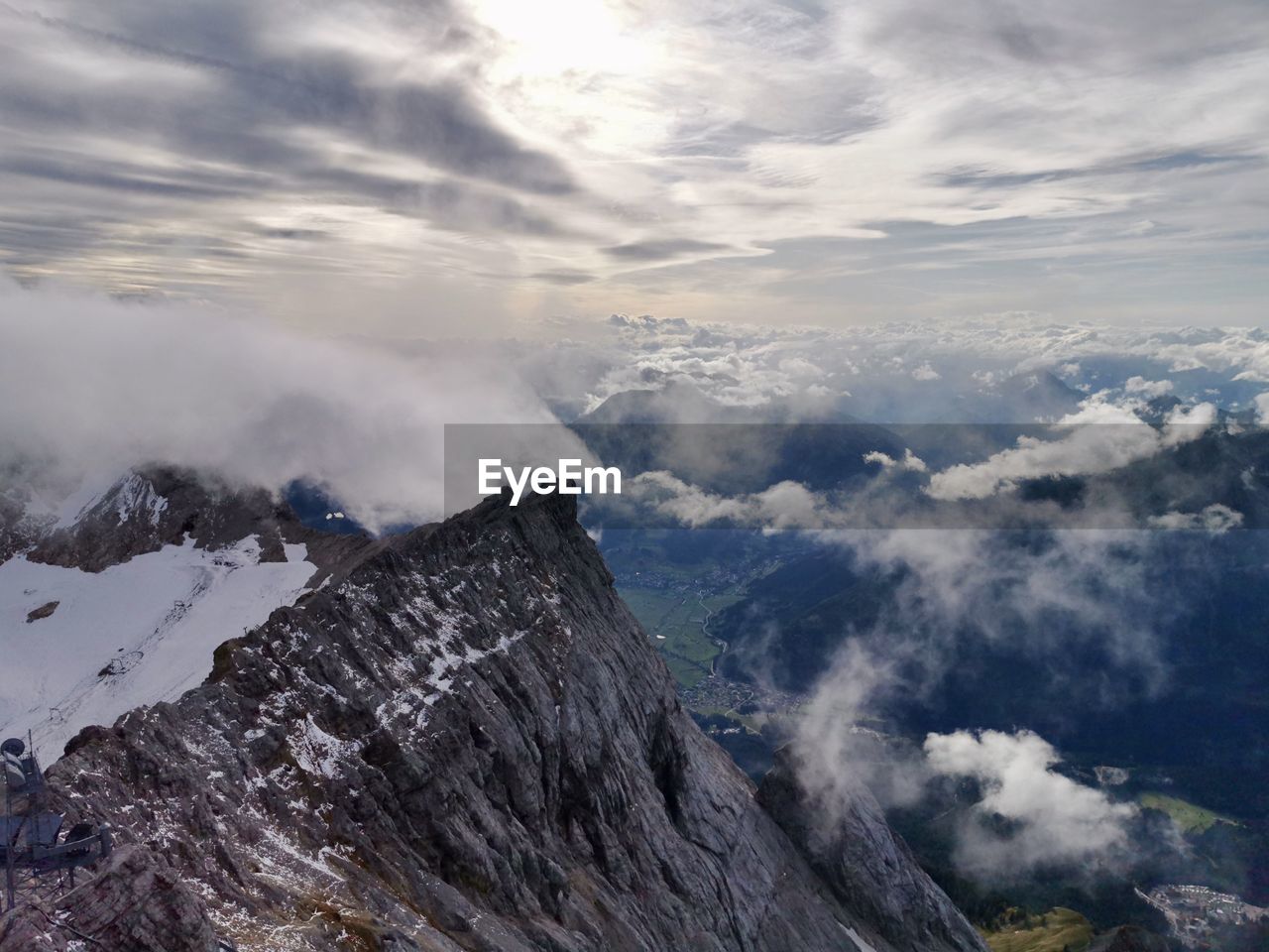 Aerial view of mountain range against sky