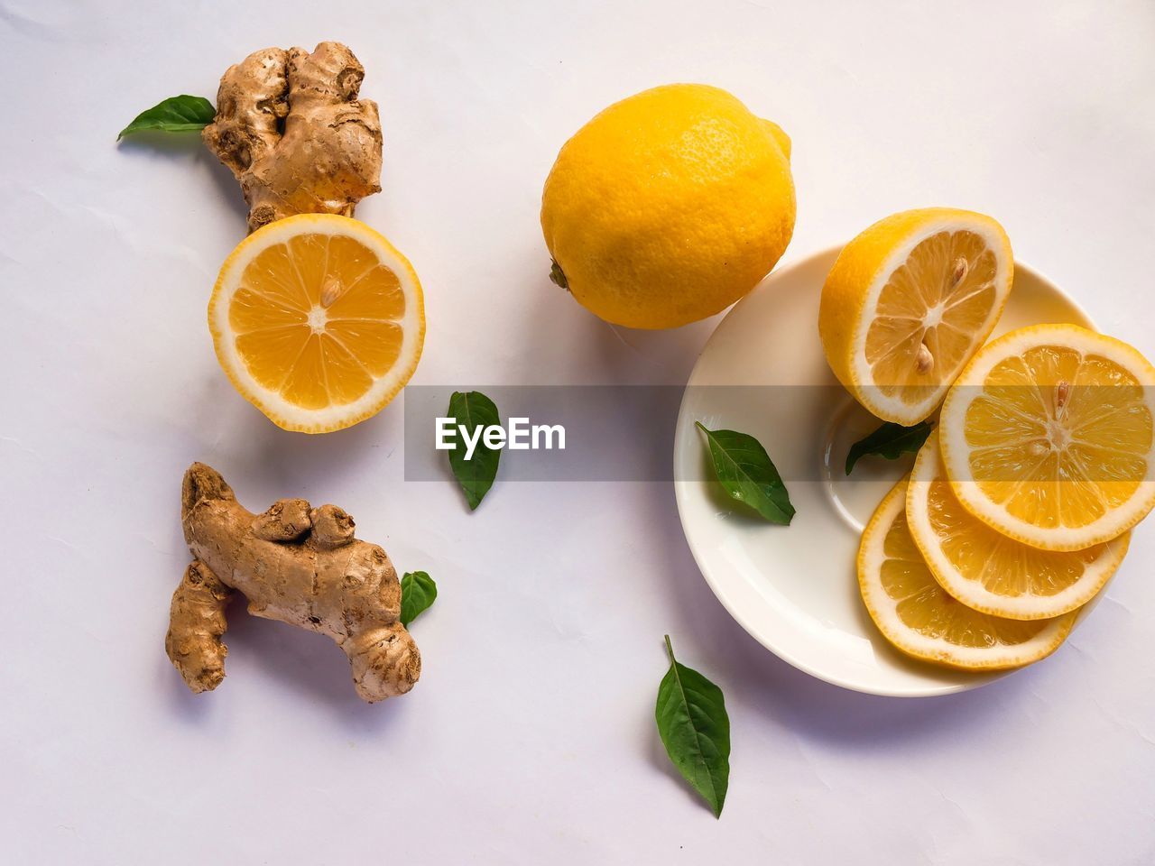 HIGH ANGLE VIEW OF FRUITS IN CONTAINER ON TABLE