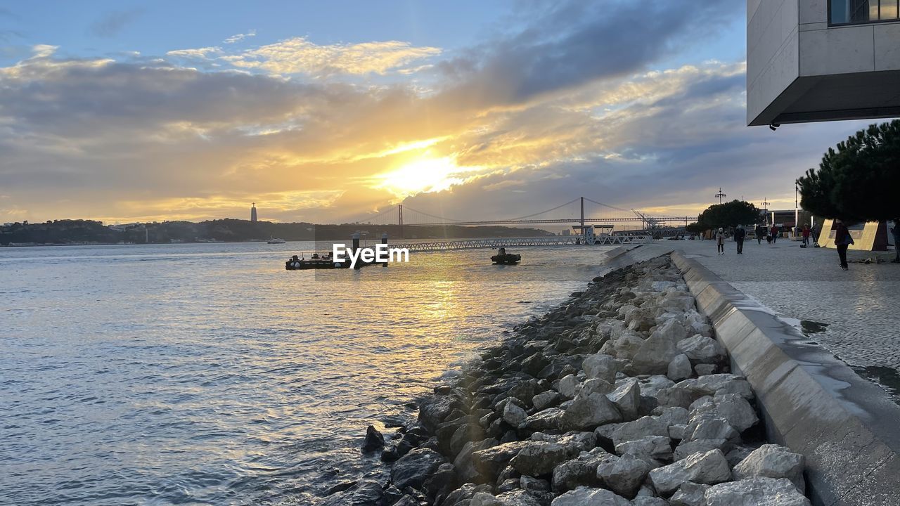 SCENIC VIEW OF SEA DURING SUNSET