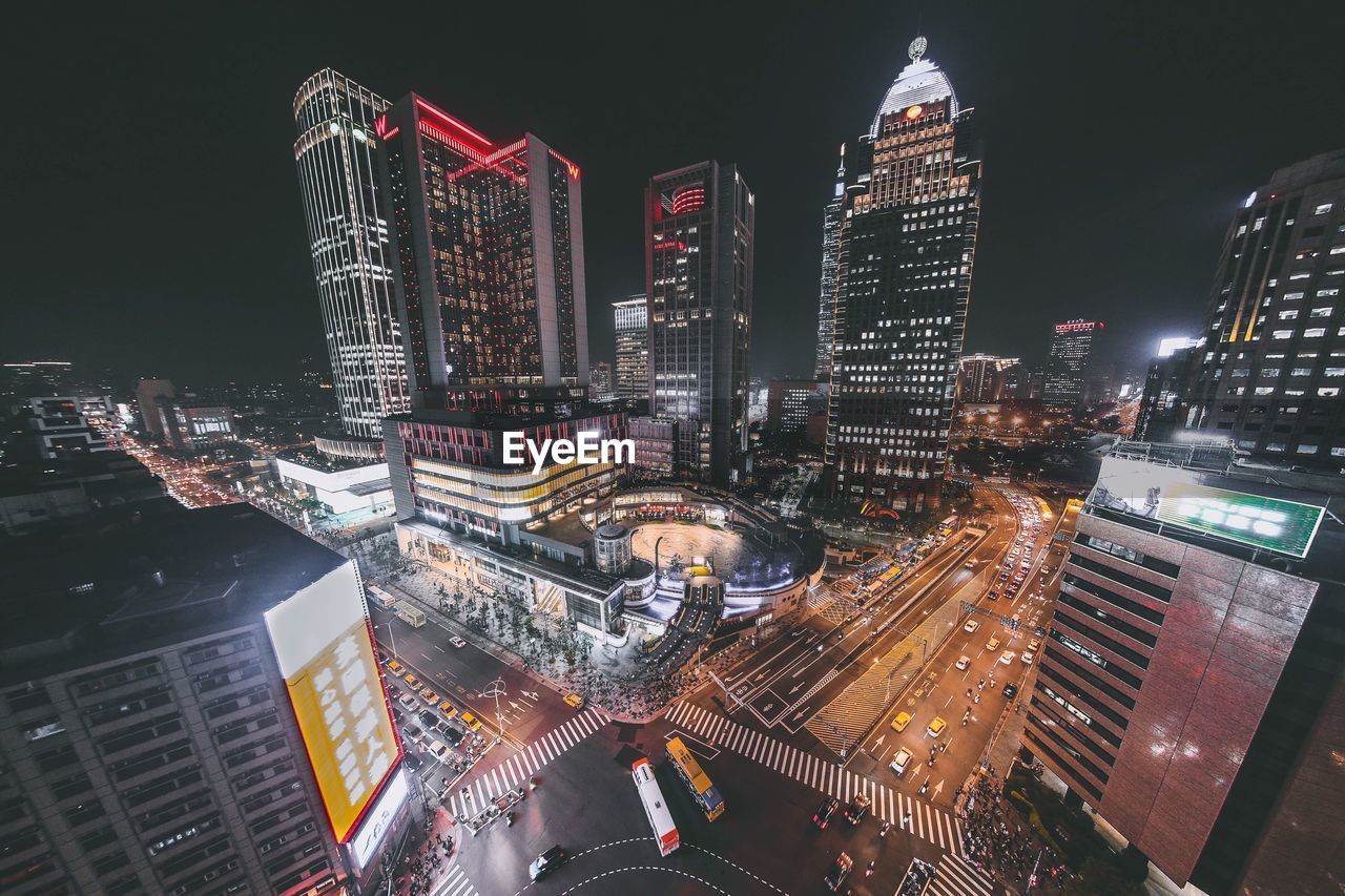 AERIAL VIEW OF ILLUMINATED CITY