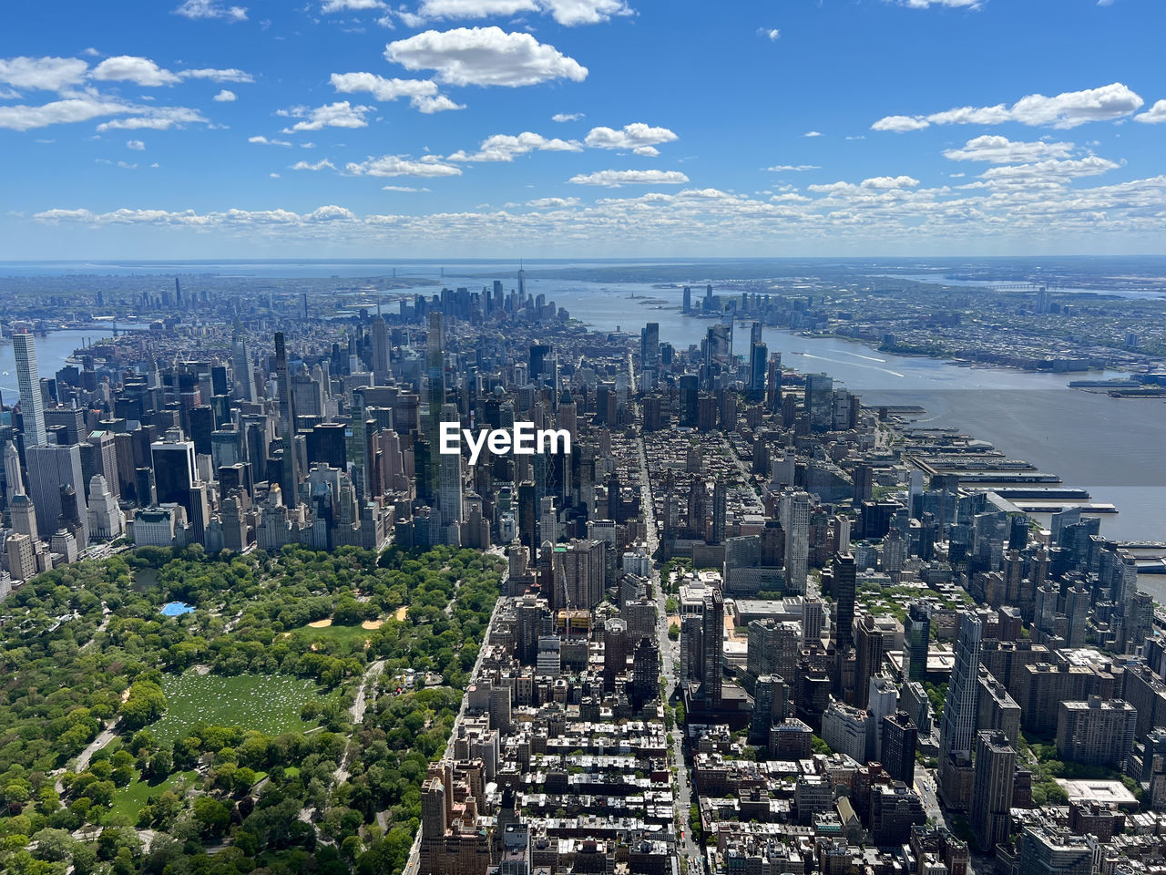 city, architecture, cityscape, built structure, building exterior, building, landscape, aerial photography, sky, skyscraper, office building exterior, urban skyline, horizon, travel destinations, skyline, nature, residential district, aerial view, metropolitan area, water, metropolis, downtown district, travel, high angle view, bird's-eye view, no people, business finance and industry, city life, environment, outdoors, residential area, tourism, cloud, transportation, landmark, sea, office, blue, tower block, scenics - nature, business, urban area, downtown, street, day, land, development