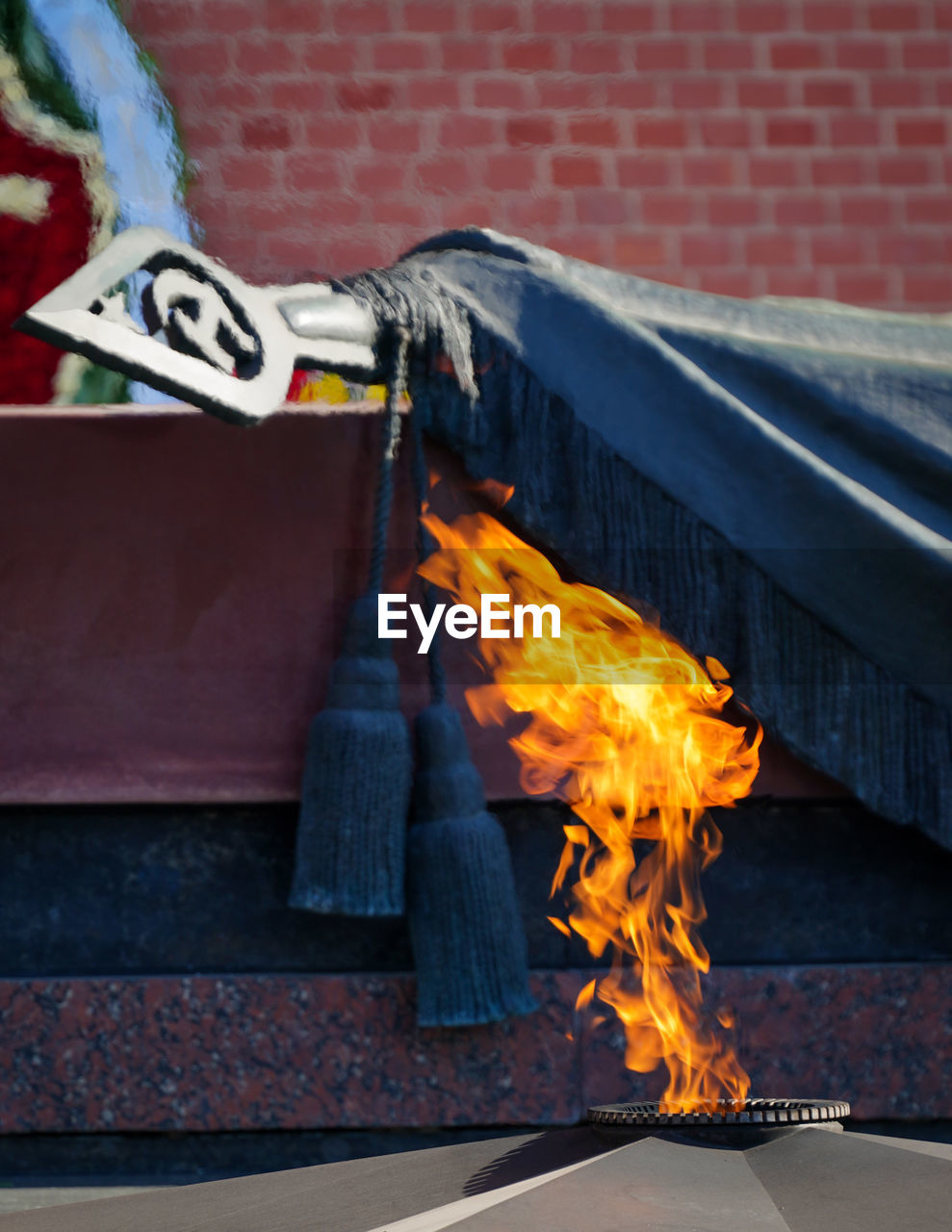 fire, burning, flame, heat, blue, fireplace, architecture, sign, nature, red, no people, communication, brick, outdoors, day, brick wall, built structure