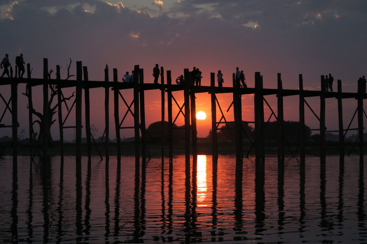 Scenic view of bridge against sky during sunset